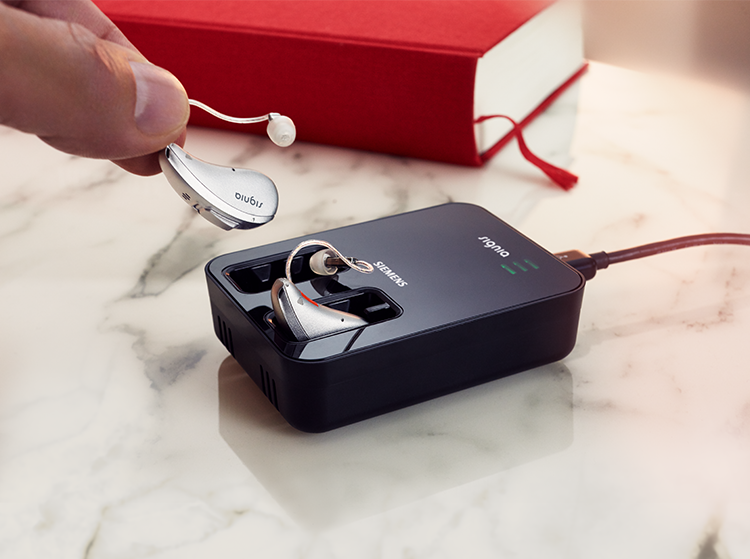Hearing aid and charger